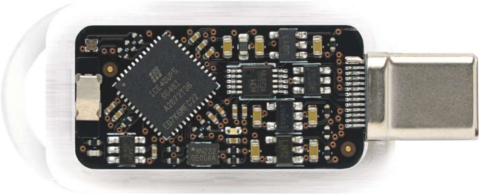 TKey with open case, showing PCBA and electronic components.